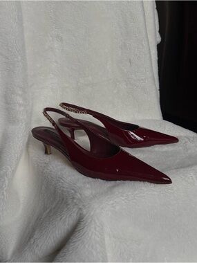 Tony Bianco burgundy kitten heel with gold chain strap